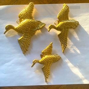 Solid brass duck plaques (3).